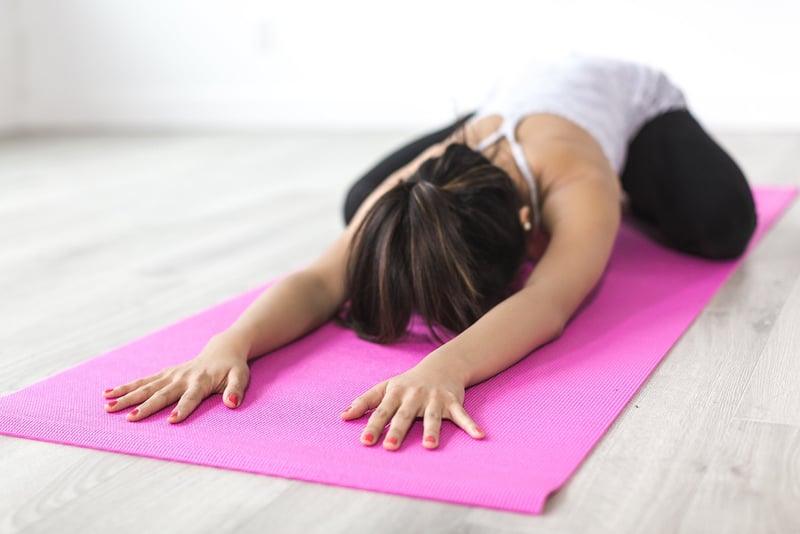 Woman practicing deep breathing